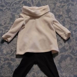 White sweater with black pants